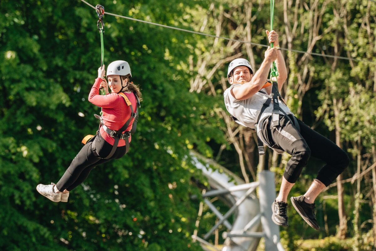 Race your friend from the top of the quarry with our Twin Ziplines at Westport Adventure. 